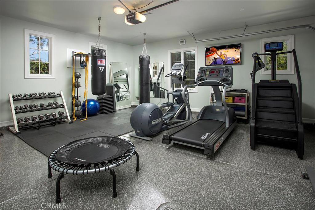 2395 Horizon Way Tustin, CA 92782 - Photo 33 of 43 a room with furniture and a flat screen tv