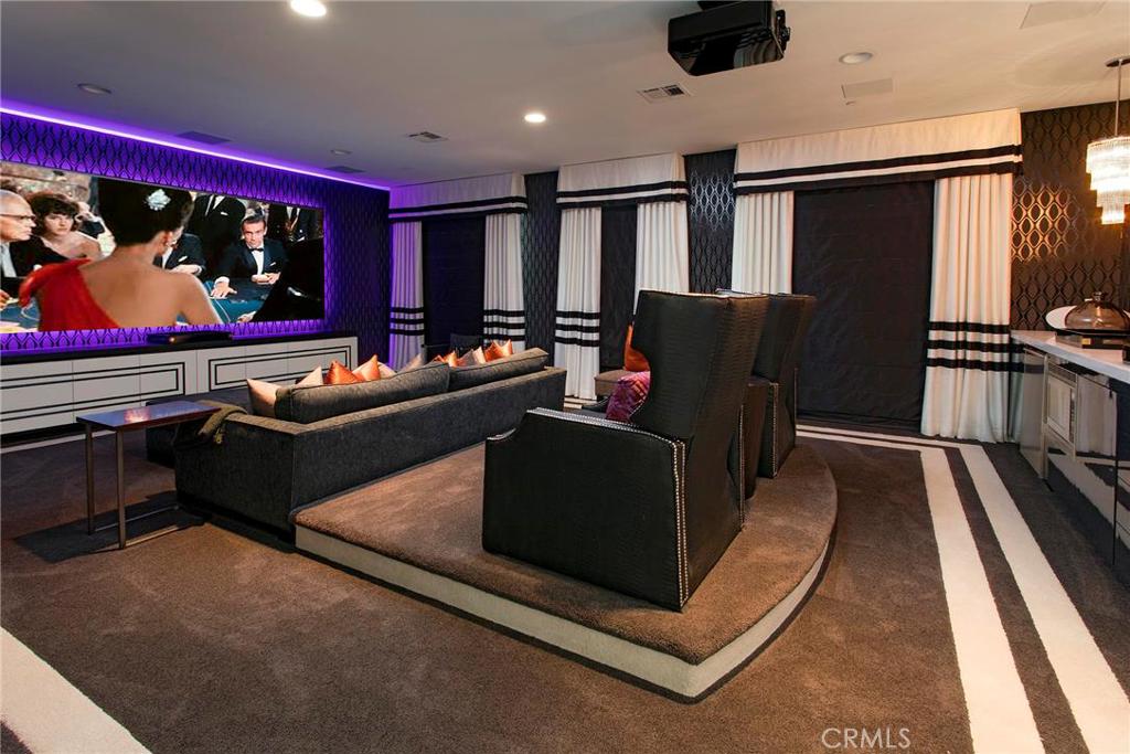 2395 Horizon Way Tustin, CA 92782 - Photo 35 of 43 a living room with furniture and a flat screen tv