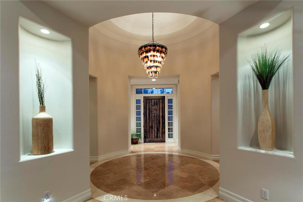 2395 Horizon Way Tustin, CA 92782 - Photo 4 of 43 a front view of a house with entryway