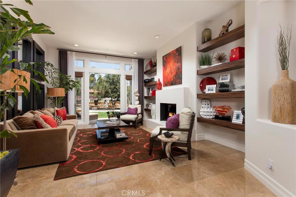 2395 Horizon Way Tustin, CA 92782 - Photo 5 of 43 a living room with furniture and a fireplace