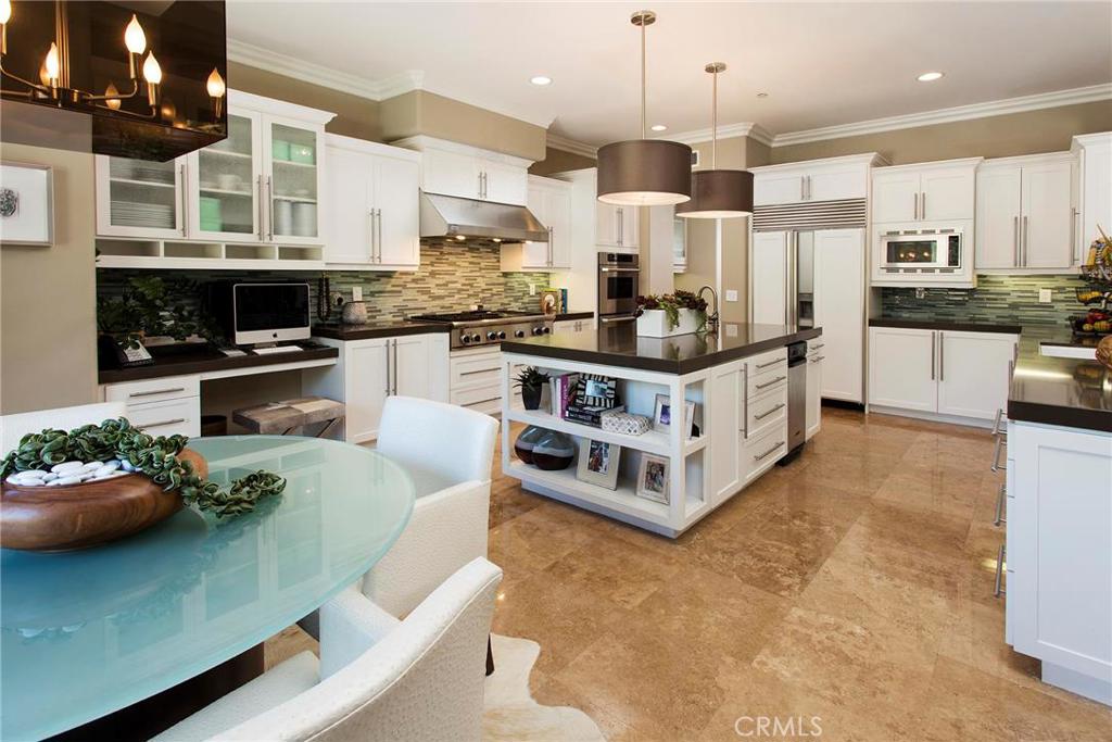 2395 Horizon Way Tustin, CA 92782 - Photo 9 of 43 a kitchen with stainless steel appliances granite countertop a stove and a refrigerator