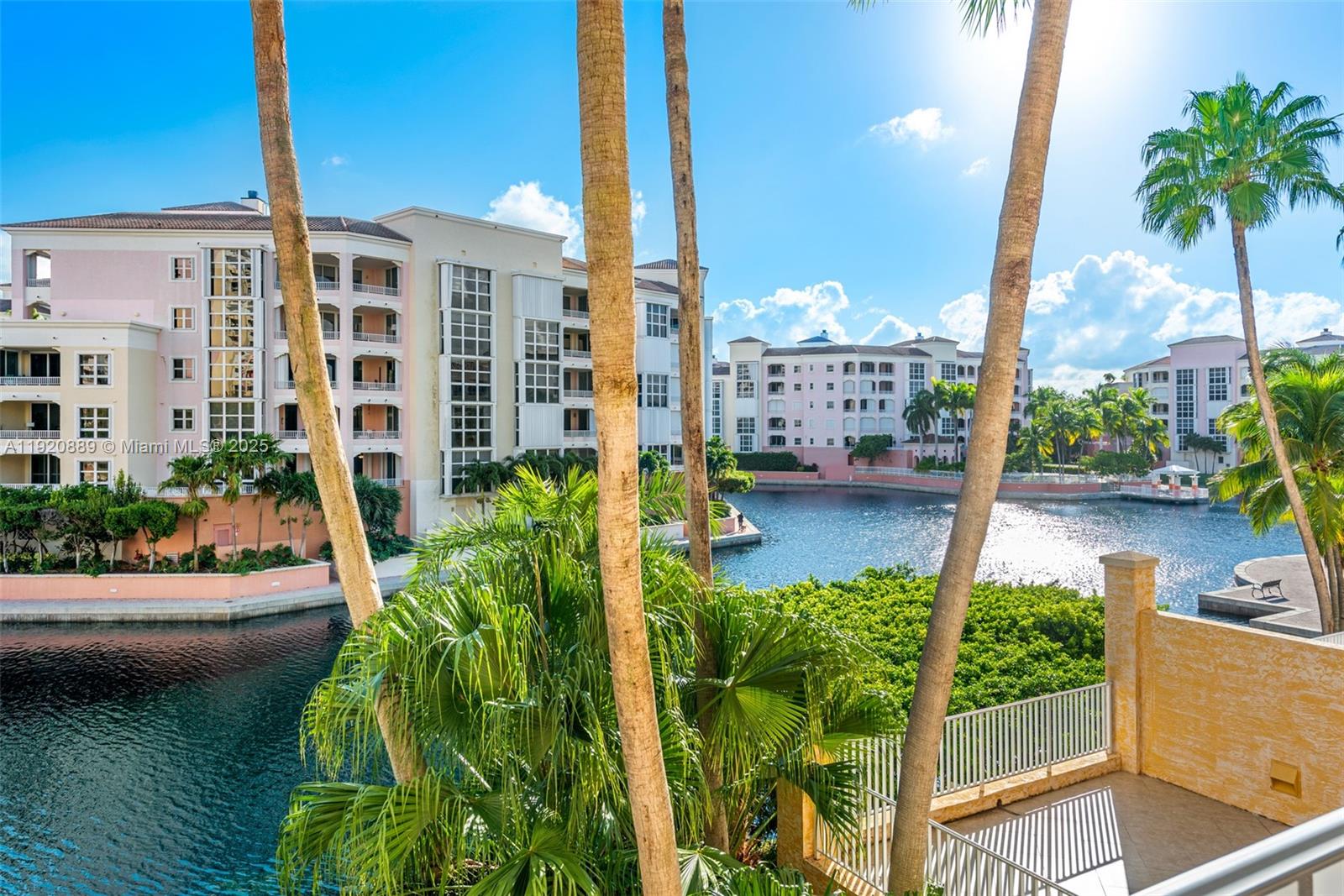 715 Crandon Boulevard, Unit 305 Key Biscayne, FL 33149 - Photo 18 of 20 a view of a balcony with potted plants