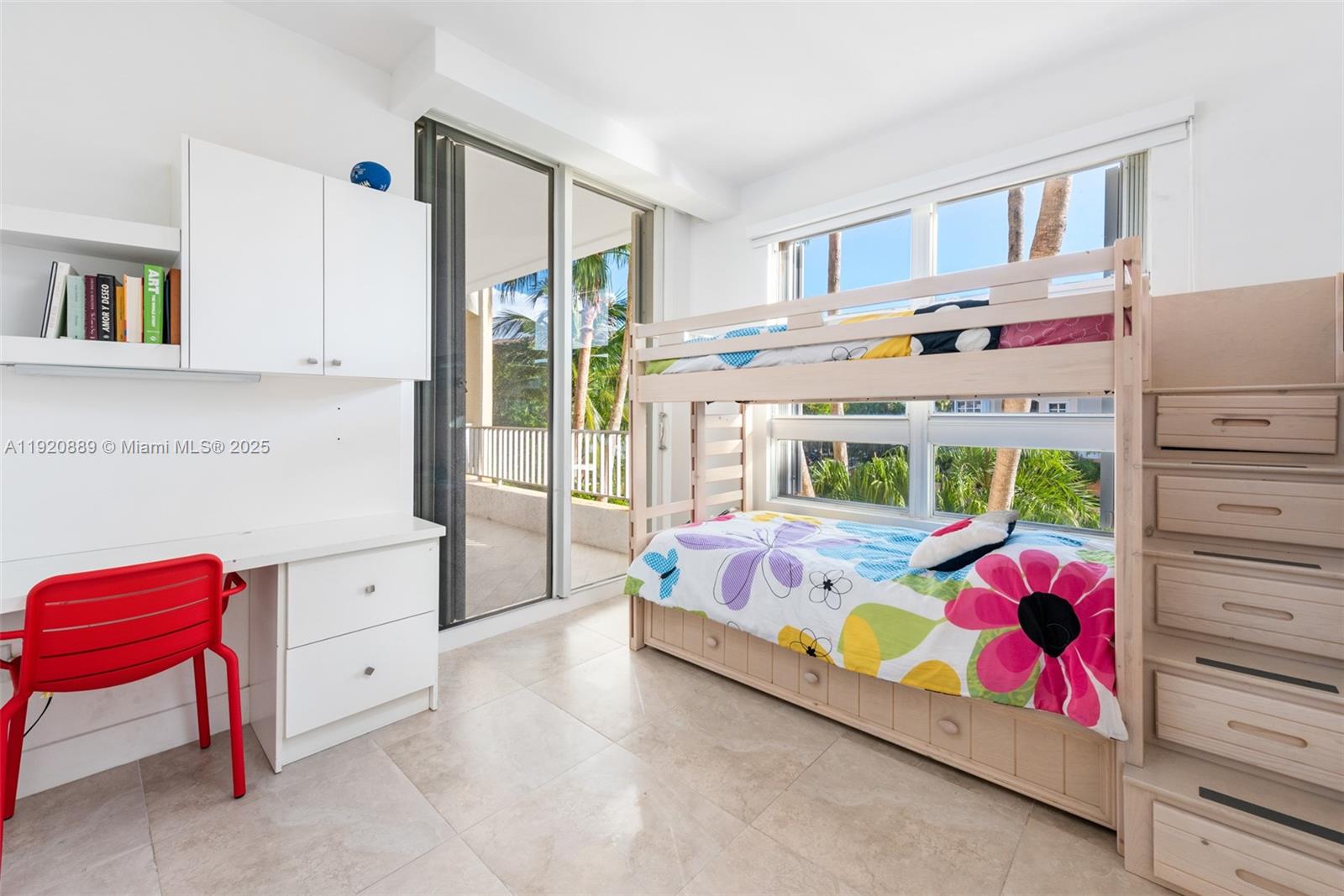 715 Crandon Boulevard, Unit 305 Key Biscayne, FL 33149 - Photo 8 of 20 a bedroom with a bed and a window