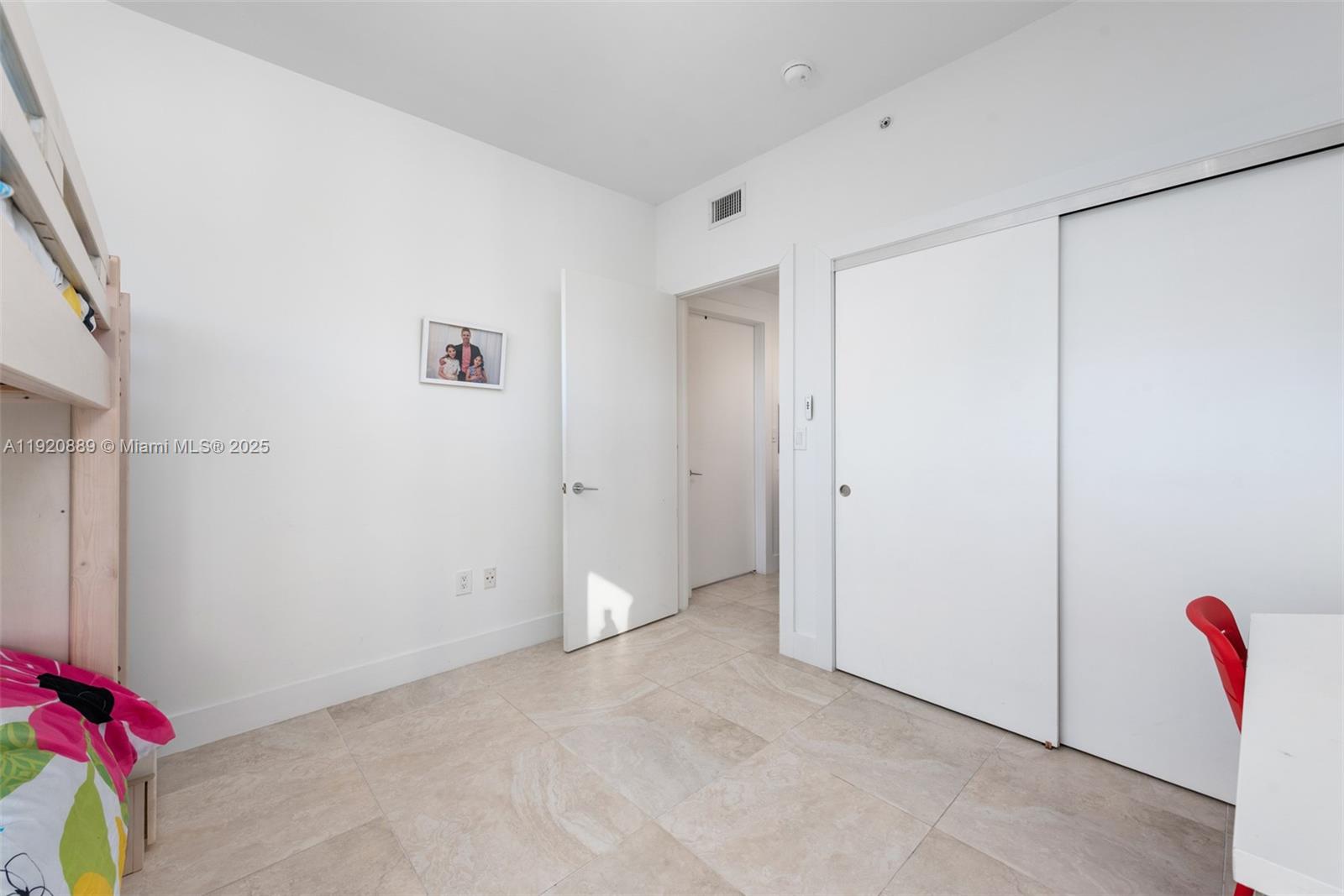 715 Crandon Boulevard, Unit 305 Key Biscayne, FL 33149 - Photo 9 of 20 a view of room with closet