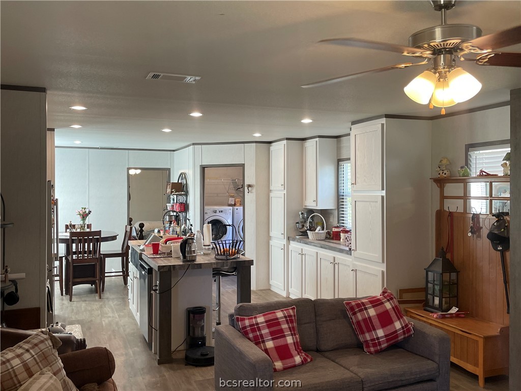 11320 Old Hearne Road Bryan, TX 77807 - Photo 11 of 26 a living room with furniture and a flat screen tv