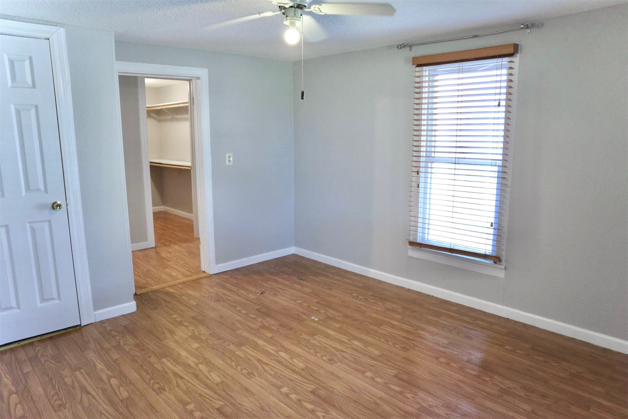 503 State Highway 95 Granger, TX 76530 - Photo 20 of 39 a view of an empty room with wooden floor and a window