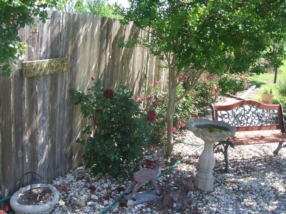 503 State Highway 95 Granger, TX 76530 - Photo 30 of 39 a view of a fountain in the backyard of a house