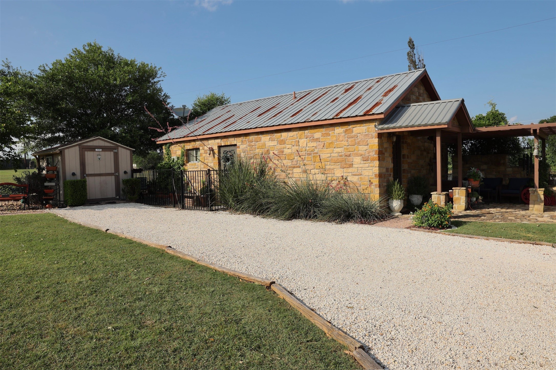 503 State Highway 95 Granger, TX 76530 - Photo 8 of 39 a front view of a house with a yard and garage
