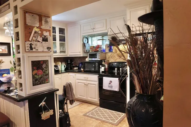 a living room with furniture and furniture