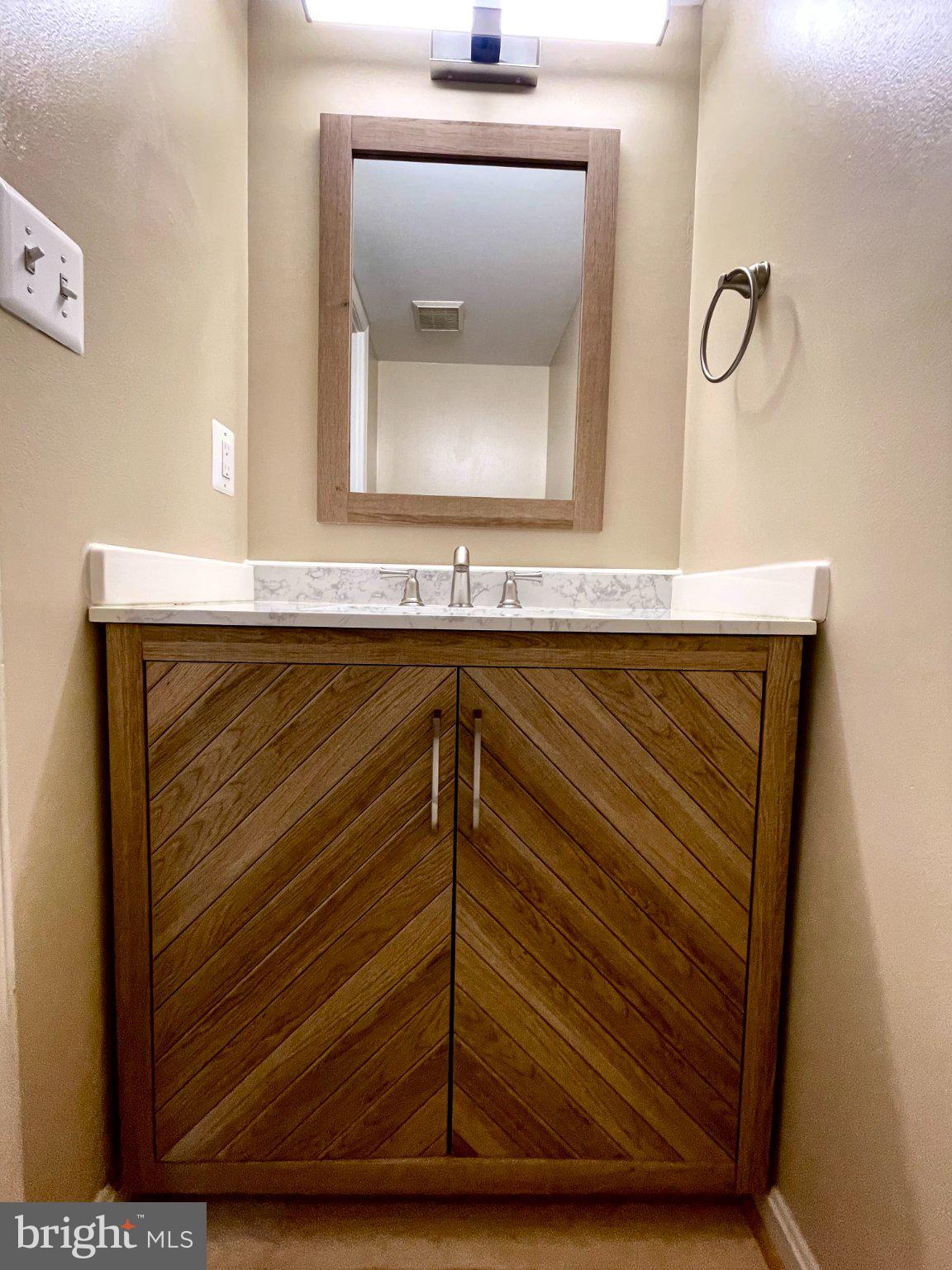 7925 Forest Path Way Springfield, VA 22153 - Photo 5 of 27 New vanity in half bath
