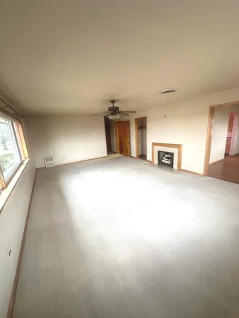 a kitchen with sink microwave and stove