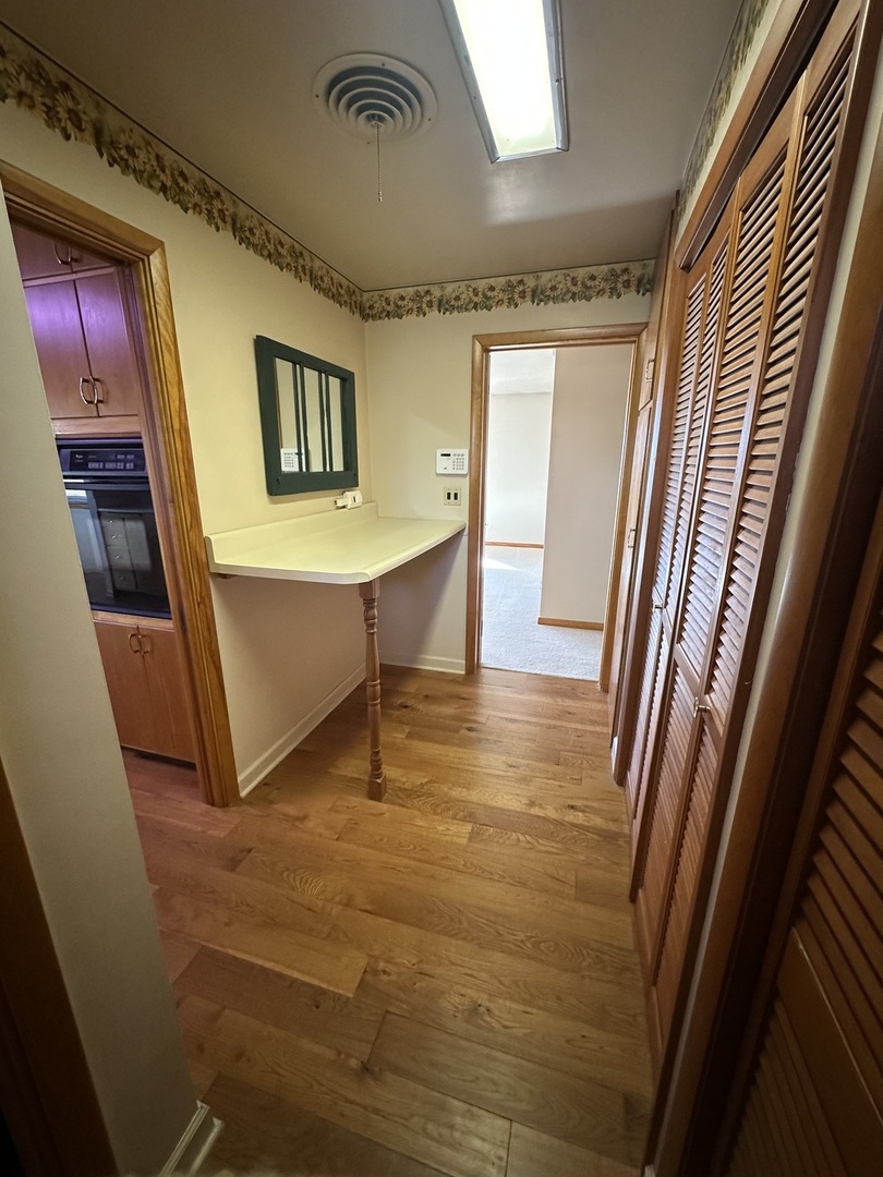 29428 East 500 North Road Le Roy, IL 61752 - Photo 24 of 79 a view of a hallway with wooden floor and staircase