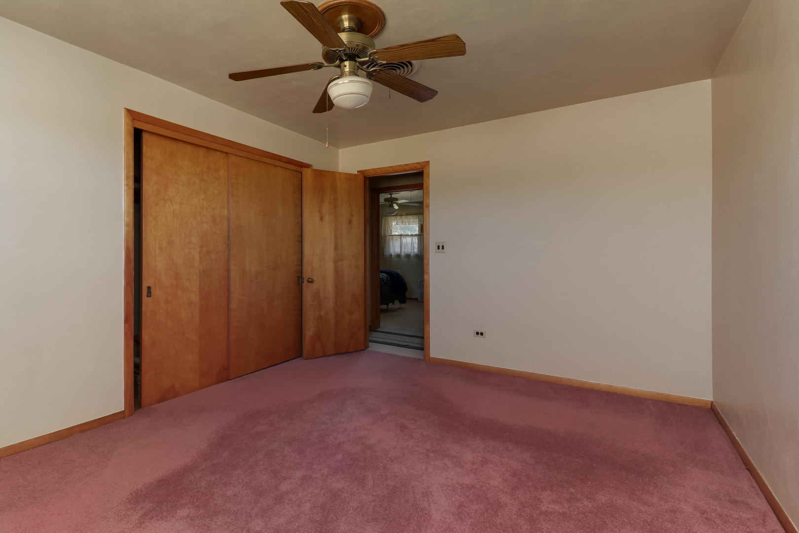 29428 East 500 North Road Le Roy, IL 61752 - Photo 32 of 79 an empty room with a ceiling fan and a window