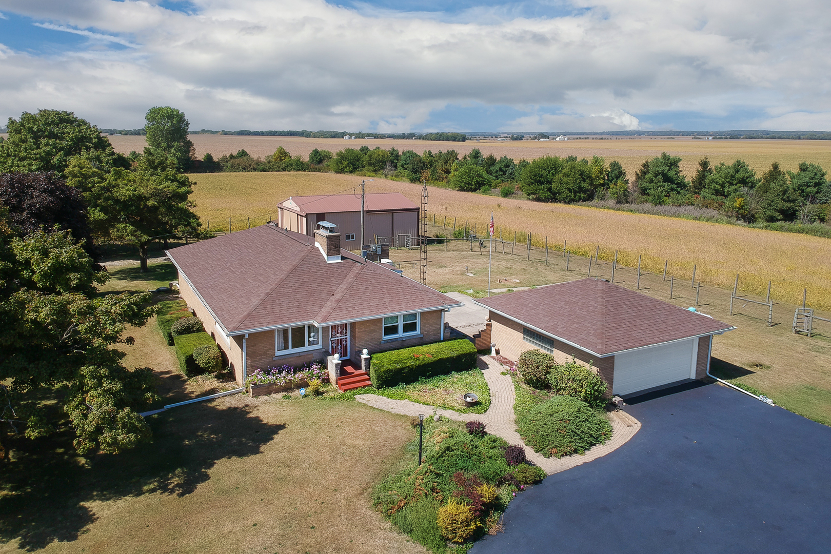 29428 East 500 North Road Le Roy, IL 61752 - Photo 4 of 79 an aerial view of a house with big yard and large trees