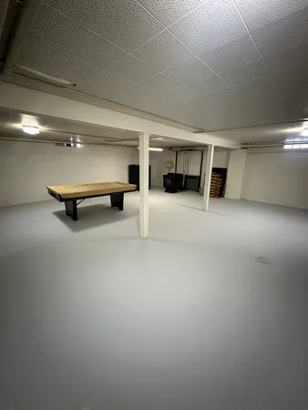 a view of a big room with a small yard and a fire pit