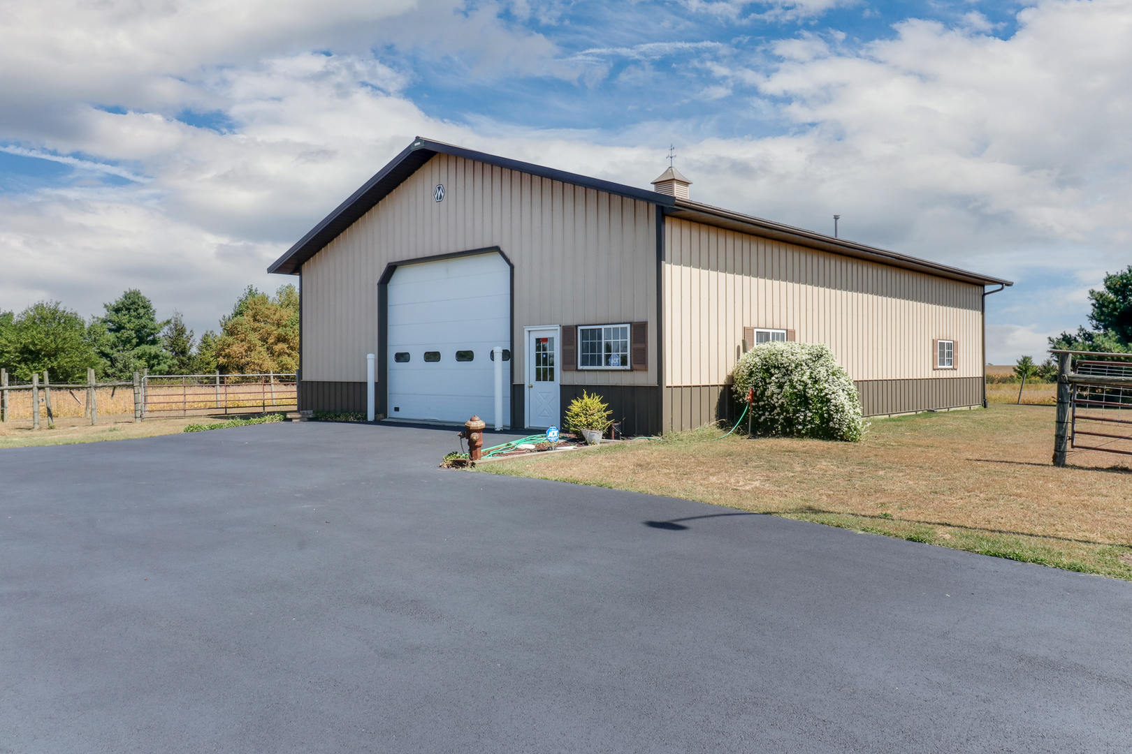 29428 East 500 North Road Le Roy, IL 61752 - Photo 54 of 79 a front view of a house with a yard and garage