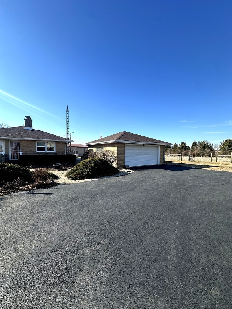 29428 East 500 North Road Le Roy, IL 61752 - Photo 72 of 79 a car parked in front of a building