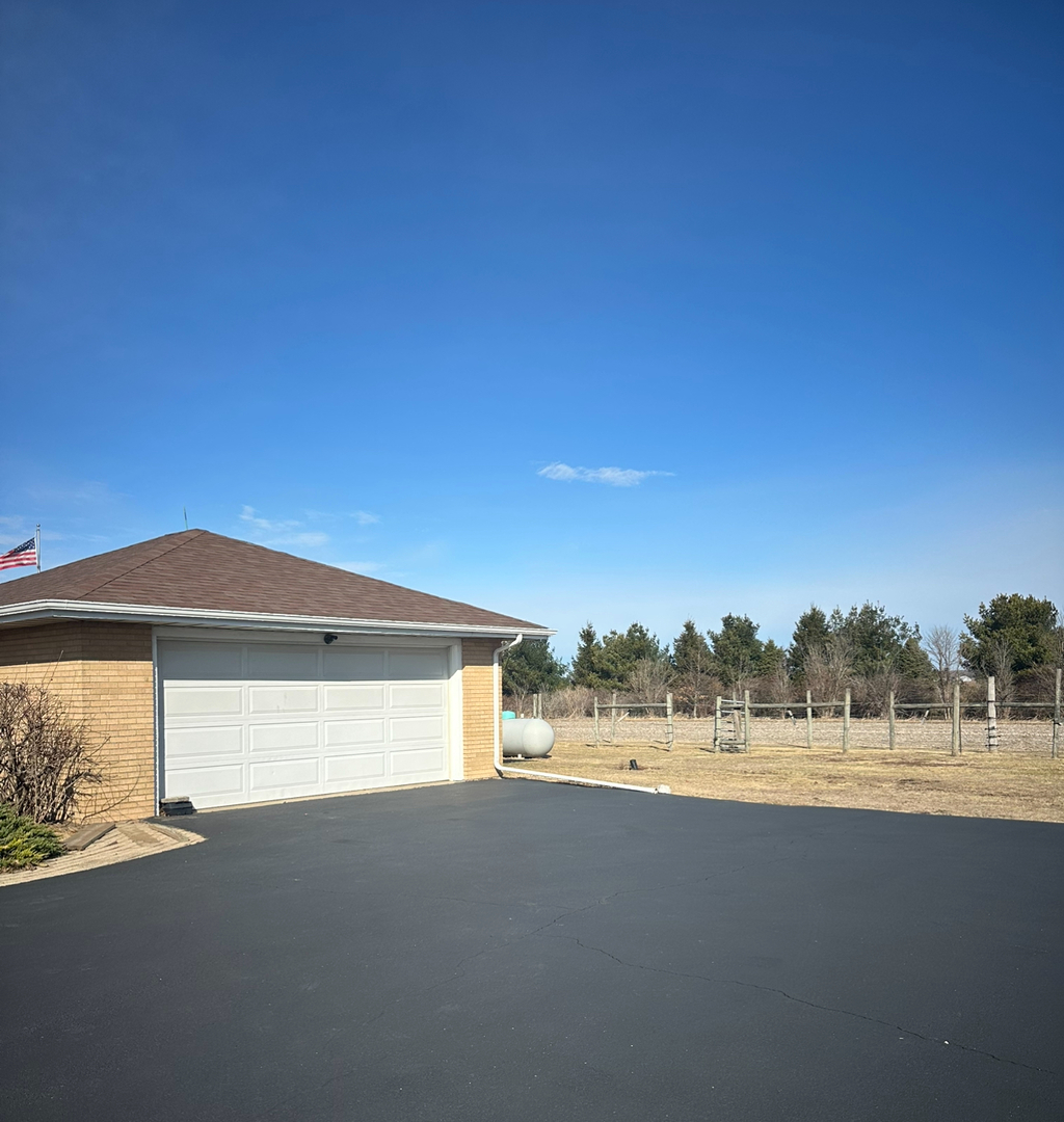 29428 East 500 North Road Le Roy, IL 61752 - Photo 74 of 79 a view of a big room with a small yard and a fire pit