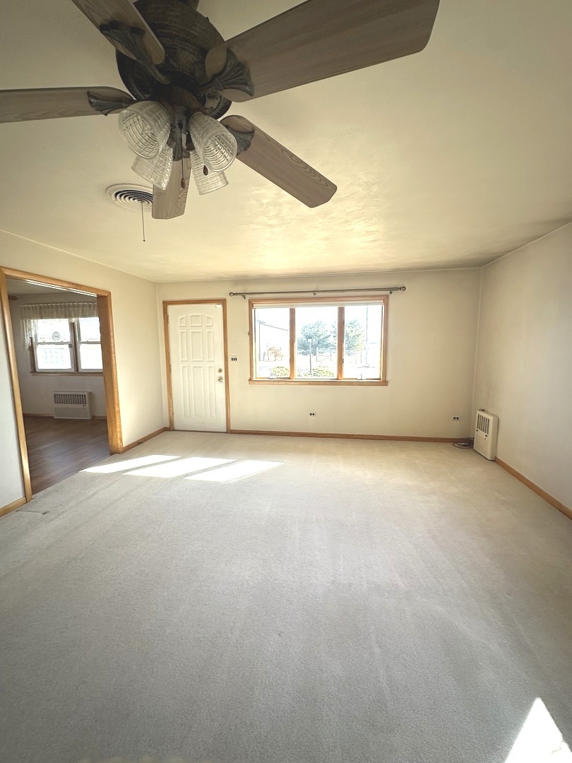 29428 East 500 North Road Le Roy, IL 61752 - Photo 10 of 79 an empty room with a empty space and windows