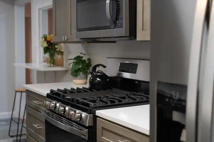 3506 McCorkle Road Memphis, TN 38116 - Photo 5 of 12 a stove top oven sitting inside of a kitchen