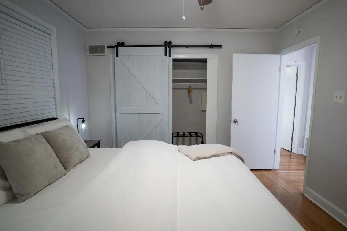 3506 McCorkle Road Memphis, TN 38116 - Photo 8 of 12 a bedroom with a bed and a walk in closet