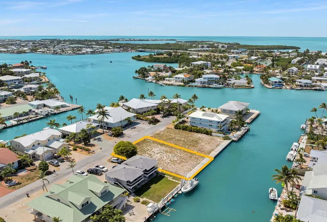 an aerial view of a city with lawn chairs