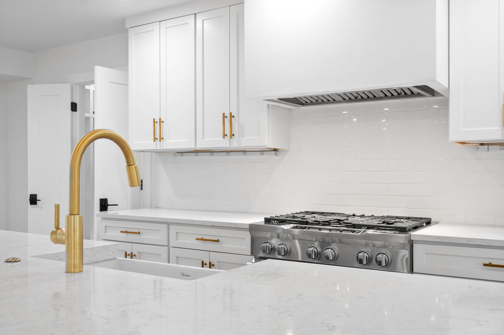 493 Georgetown Road Clarksville, TN 37043 - Photo 11 of 42 a kitchen with stainless steel appliances kitchen island a white stove top oven and sink
