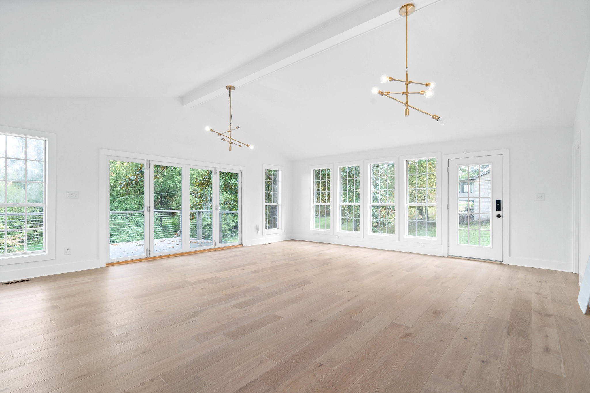 493 Georgetown Road Clarksville, TN 37043 - Photo 14 of 42 a view of an empty room with a window and wooden floor