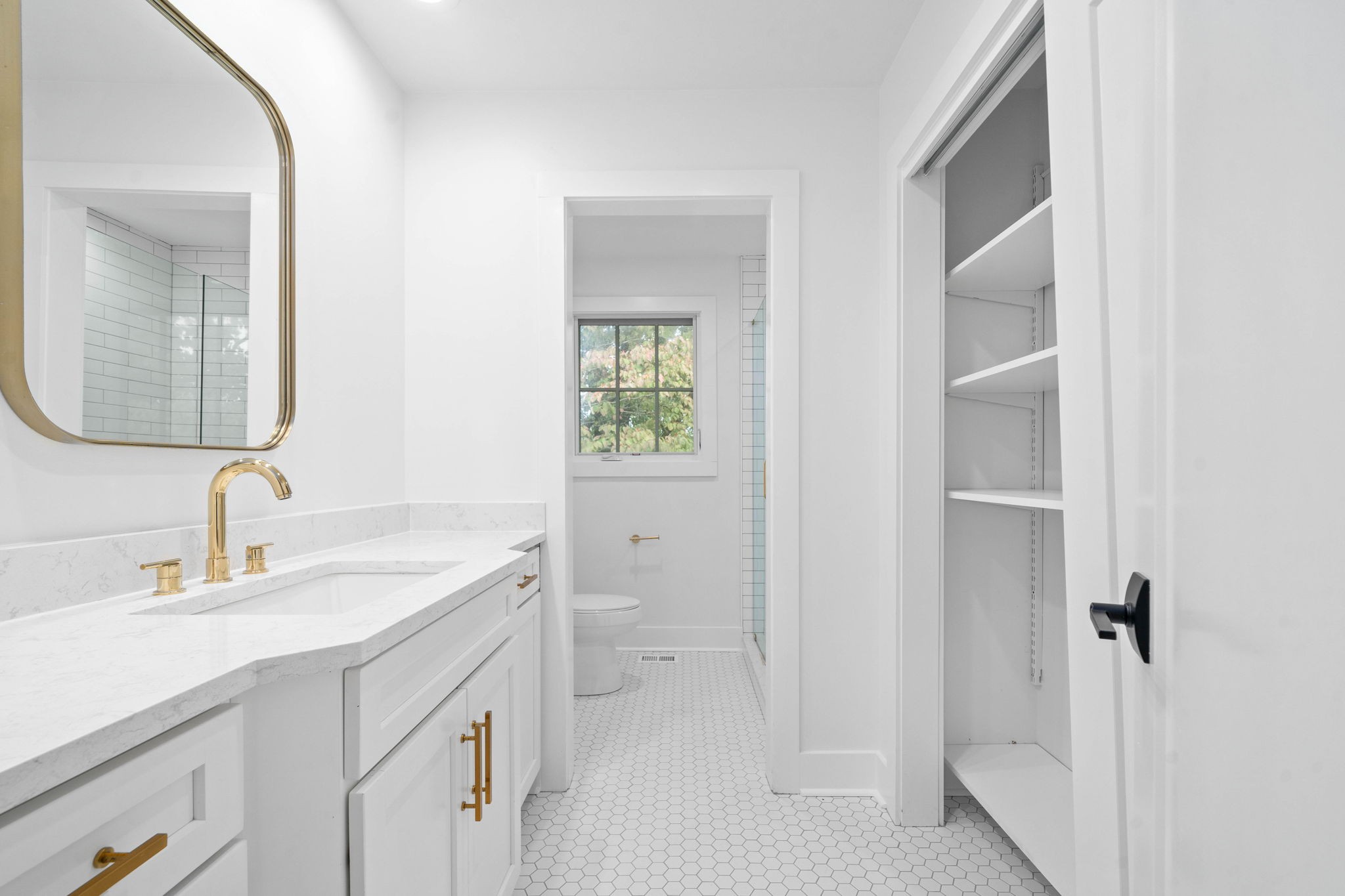 493 Georgetown Road Clarksville, TN 37043 - Photo 22 of 42 a bathroom with a sink and a mirror