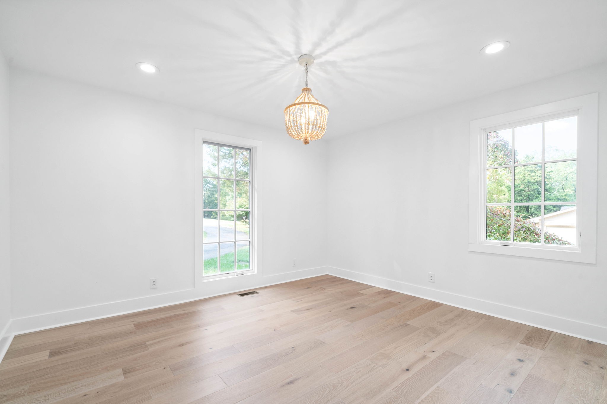 493 Georgetown Road Clarksville, TN 37043 - Photo 24 of 42 an empty room with wooden floor and windows