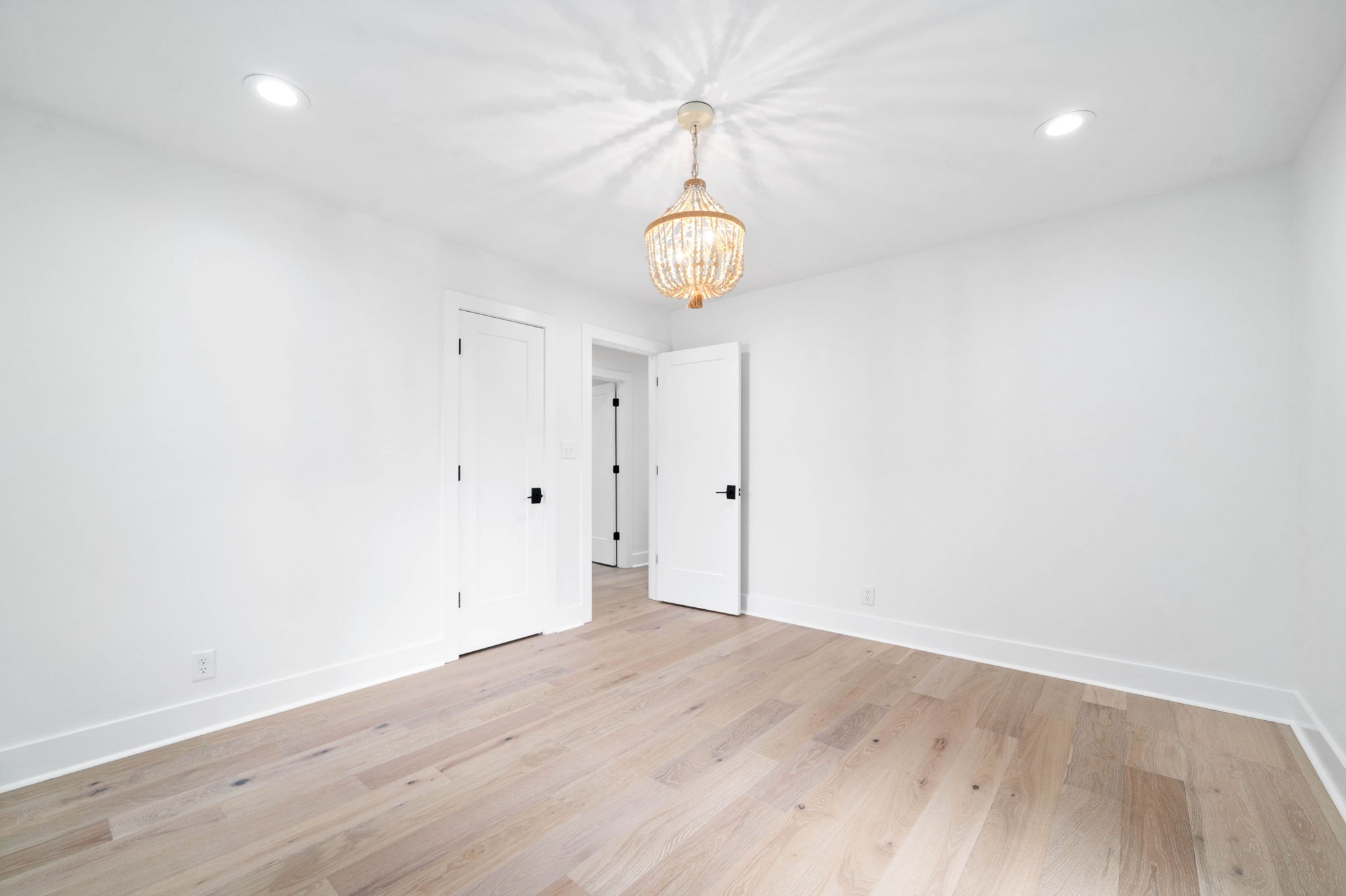 493 Georgetown Road Clarksville, TN 37043 - Photo 25 of 42 an empty room with wooden floor and windows