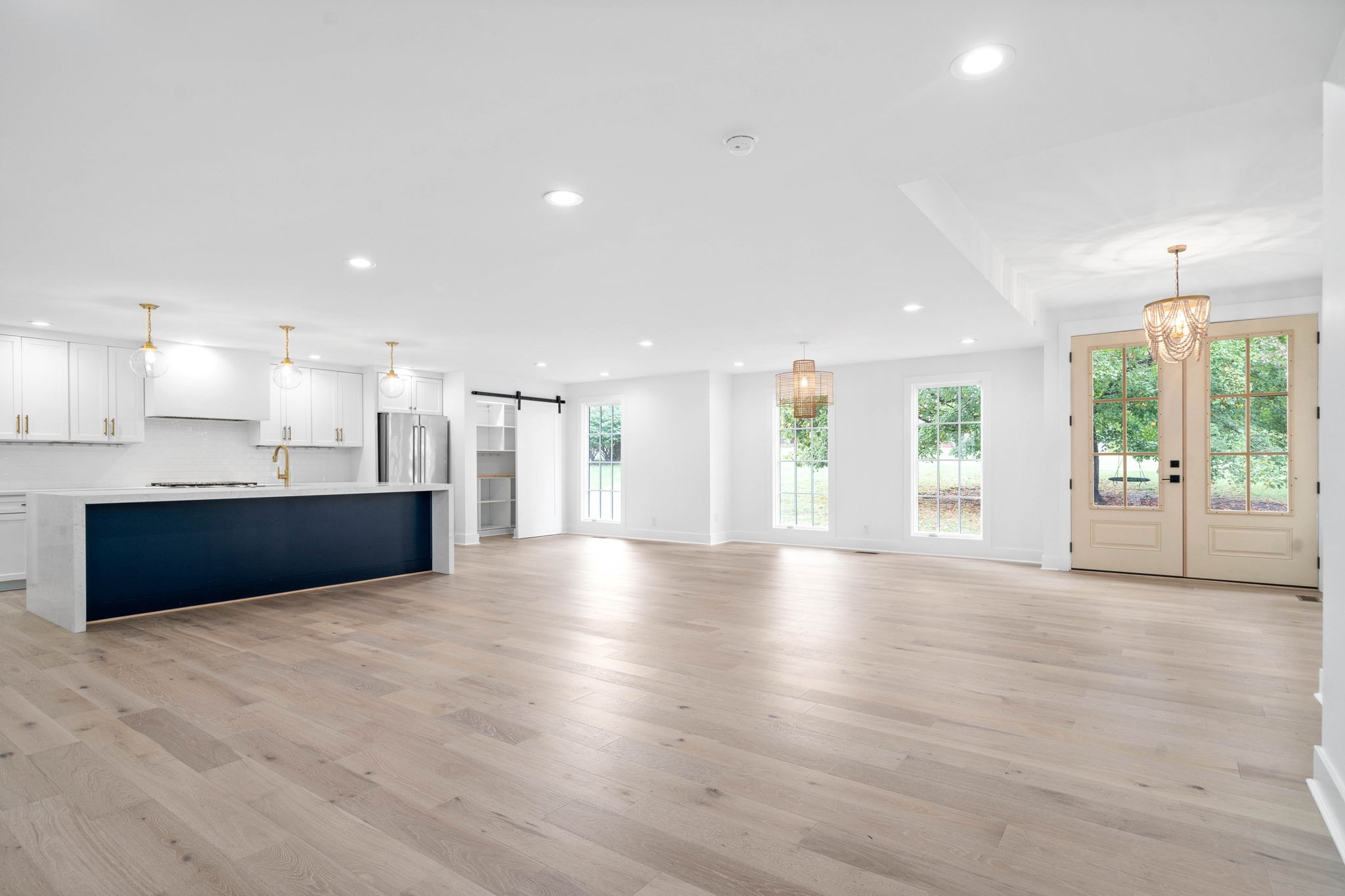 493 Georgetown Road Clarksville, TN 37043 - Photo 4 of 42 a view of an empty room with a kitchen and a window
