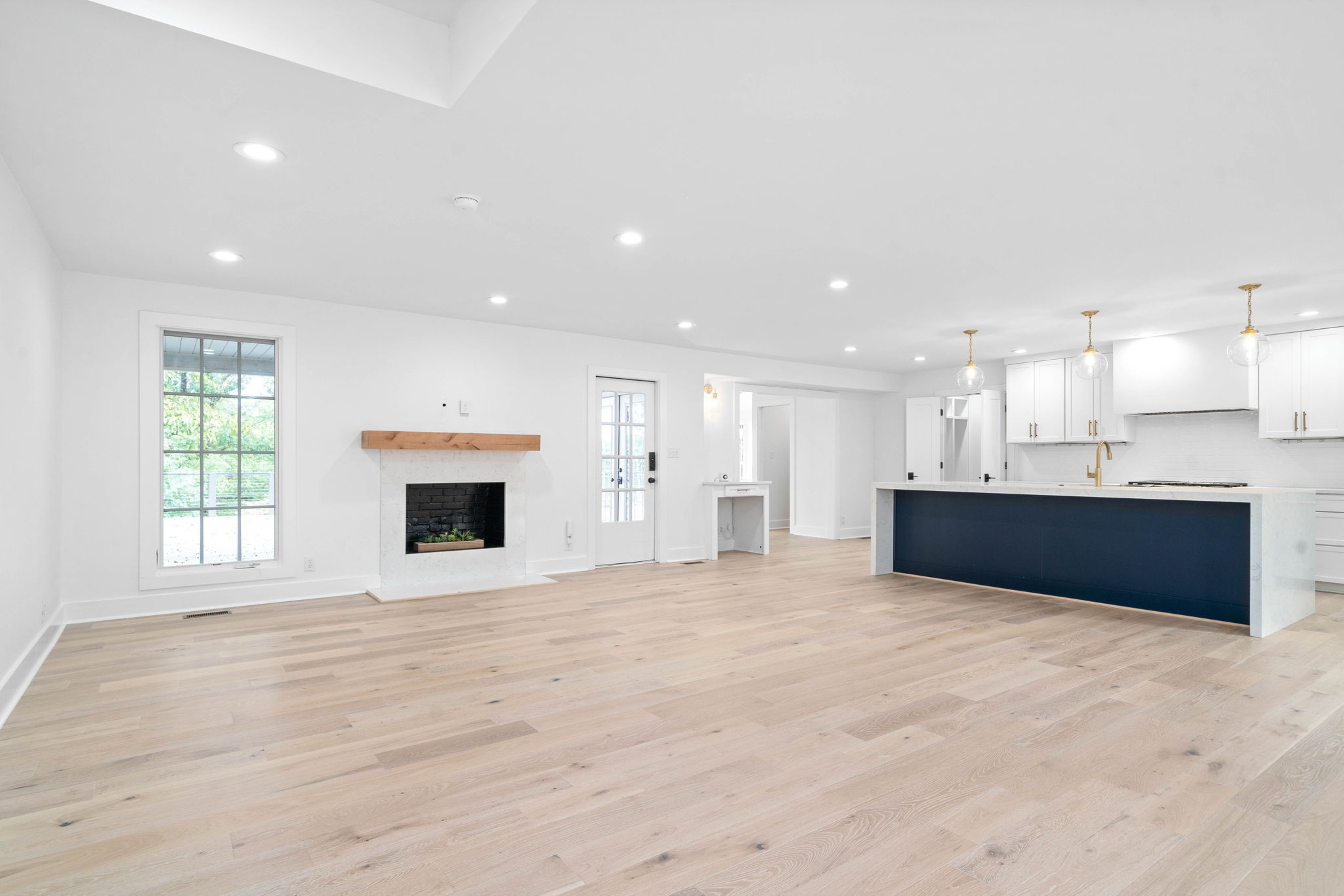 493 Georgetown Road Clarksville, TN 37043 - Photo 5 of 42 a view of an empty room with a fireplace and a window