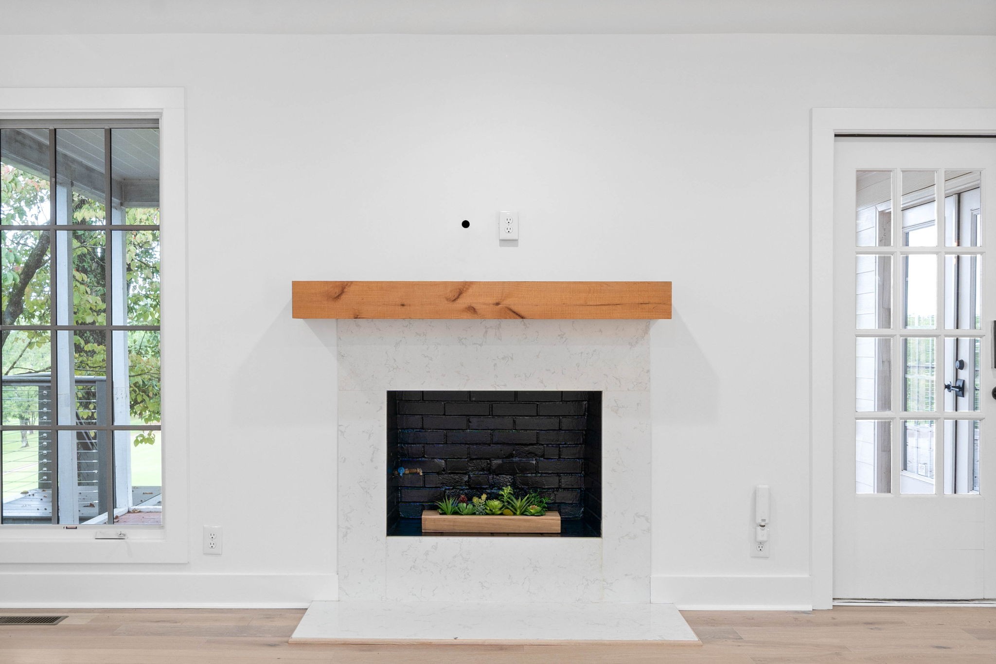 493 Georgetown Road Clarksville, TN 37043 - Photo 6 of 42 a living room with a fireplace and a window