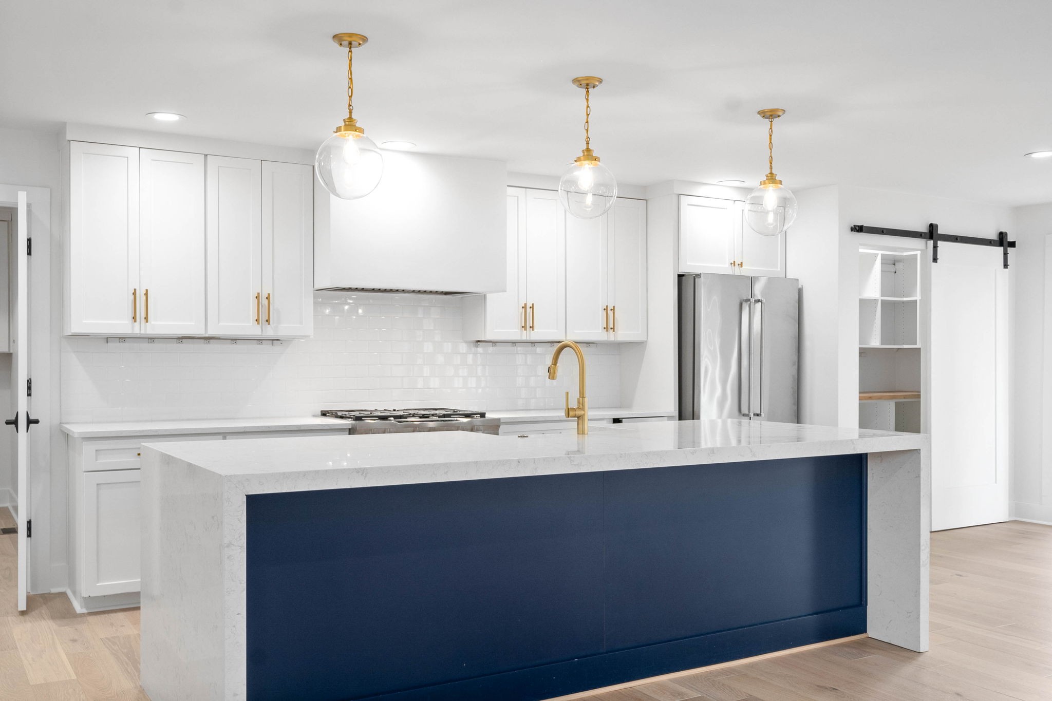 493 Georgetown Road Clarksville, TN 37043 - Photo 9 of 42 a kitchen with stainless steel appliances kitchen island a sink refrigerator and microwave