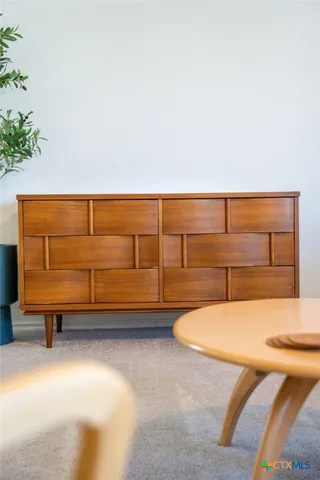 a picture of a bench in a building