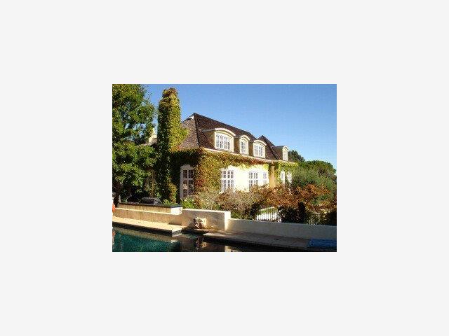 a view of car parked in front of building