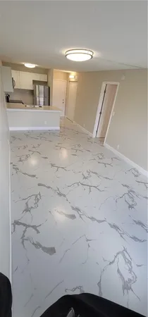 a view of a livingroom with wooden floor