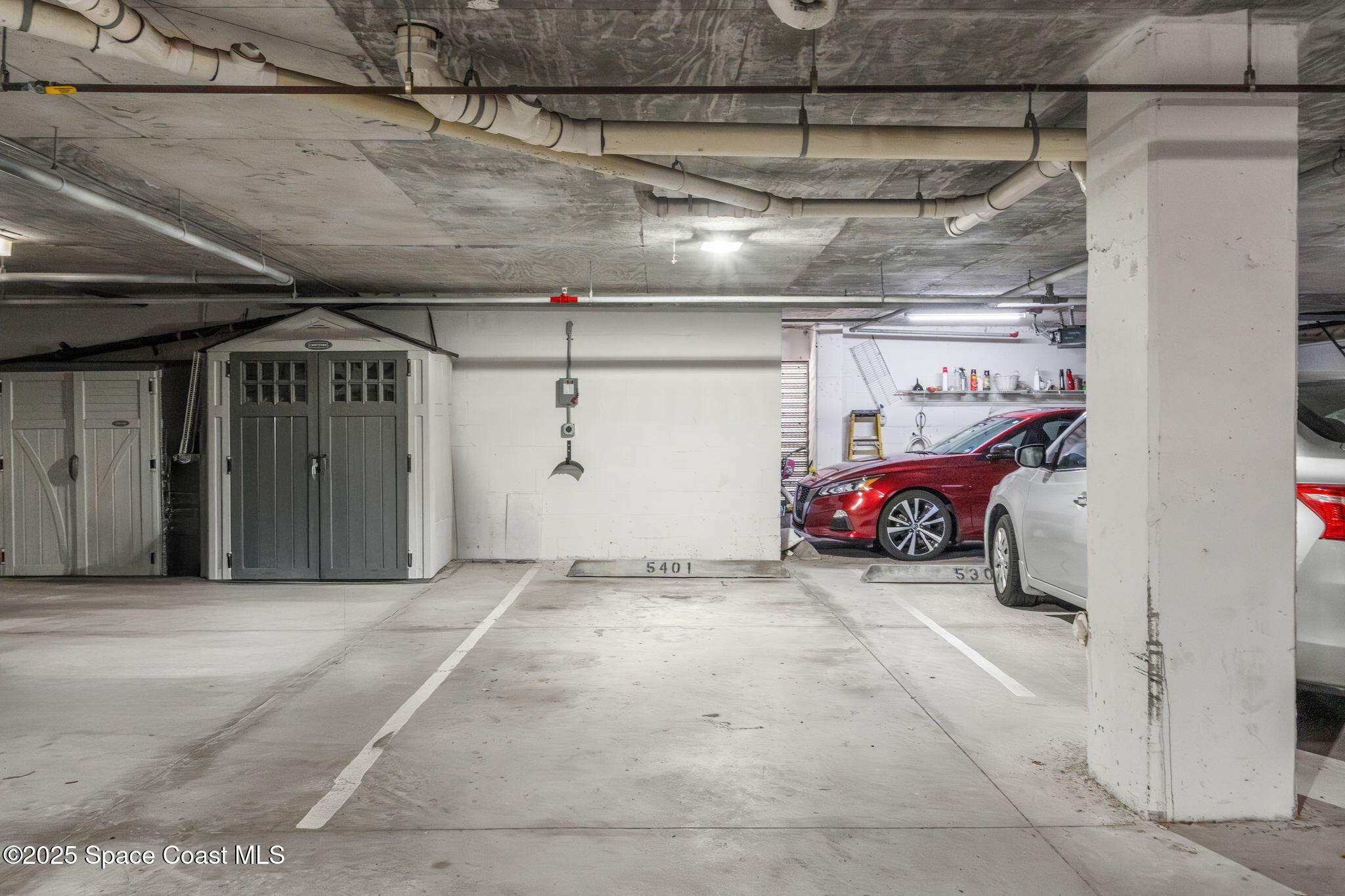 800 Del Rio Way, Unit 401 Merritt Island, FL 32953 - Photo 26 of 45 a view of parking garage