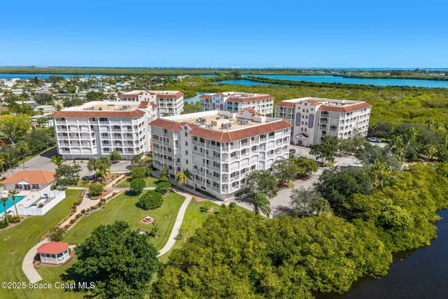a view of city with ocean