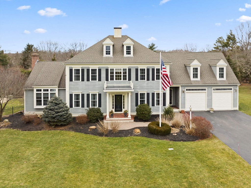 a front view of a house with sitting space and garden