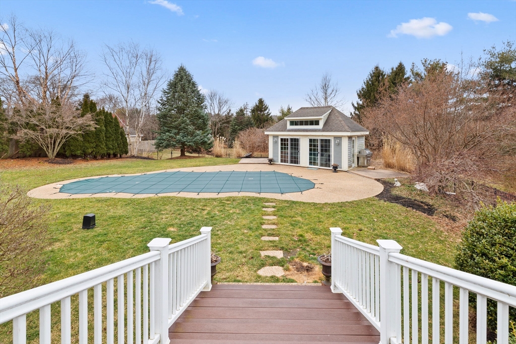 151 Tilden Road Scituate, MA 02066 - Photo 26 of 35 a view of a house with wooden floor and a yard