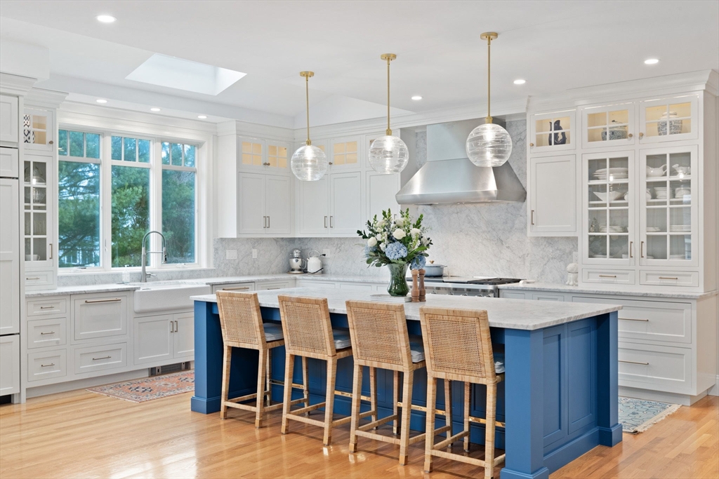 151 Tilden Road Scituate, MA 02066 - Photo 3 of 35 a kitchen with stainless steel appliances granite countertop a kitchen island a stove and a cabinets