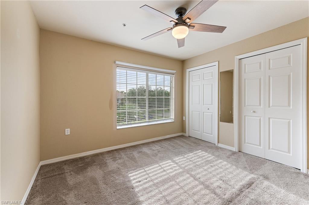 12010 Rock Brook Run, Unit 1704 Fort Myers, FL 33913 - Photo 13 of 17 a view of an empty room with a window