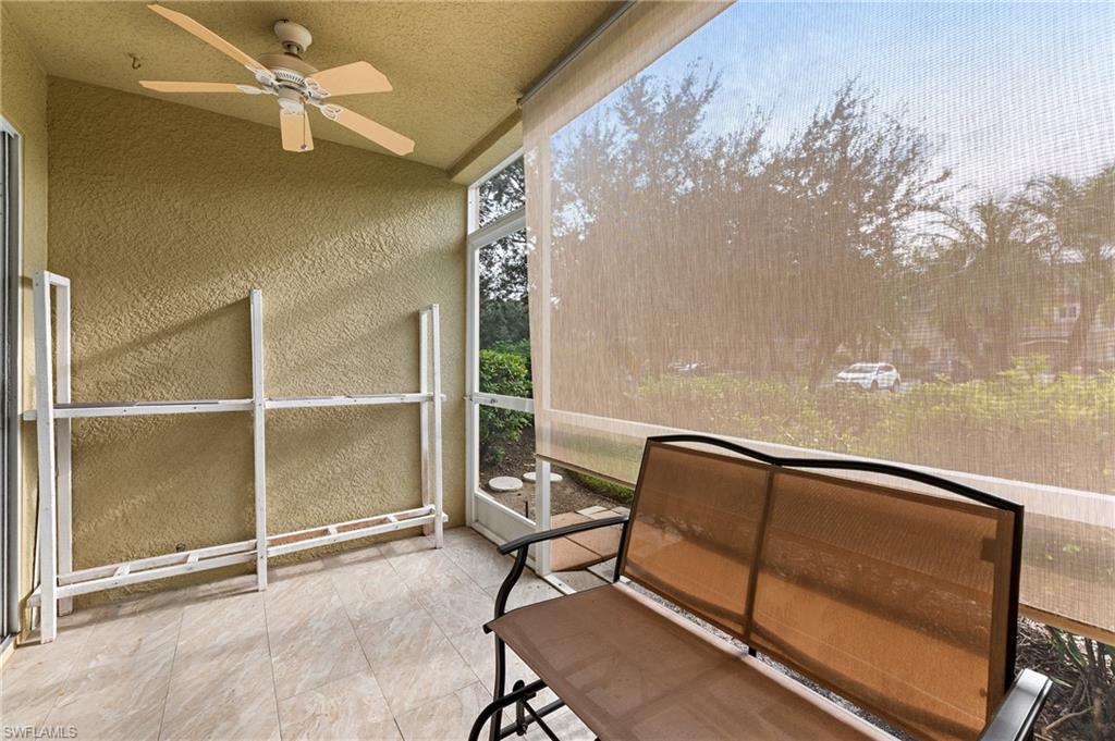 12010 Rock Brook Run, Unit 1704 Fort Myers, FL 33913 - Photo 16 of 17 a view of a room with gym equipment and a large window
