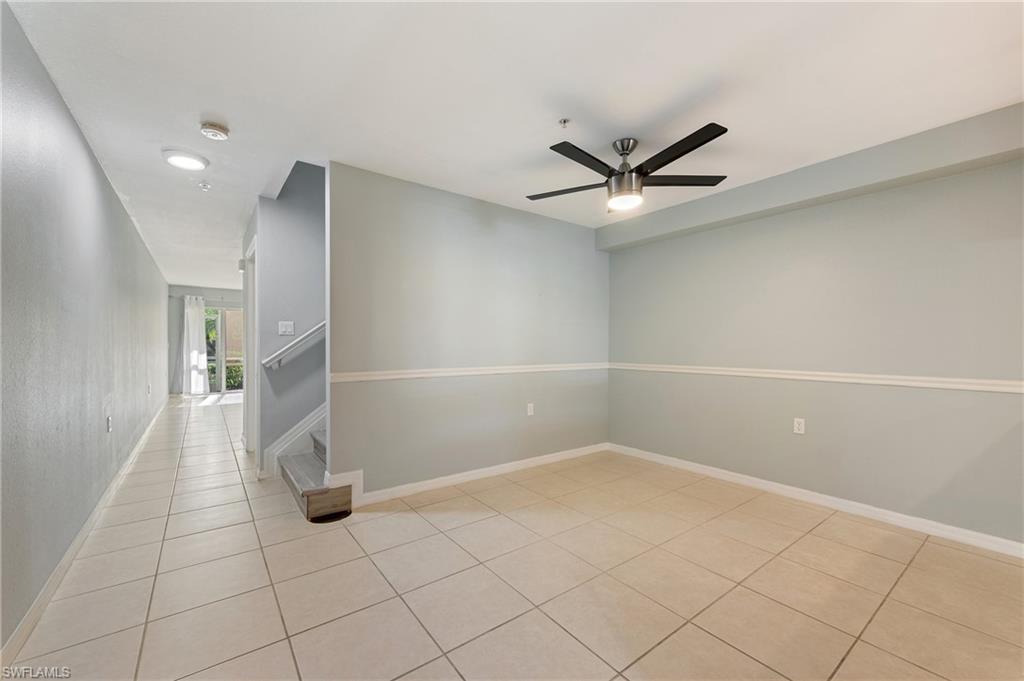 12010 Rock Brook Run, Unit 1704 Fort Myers, FL 33913 - Photo 4 of 17 wooden floor in a hall with a window