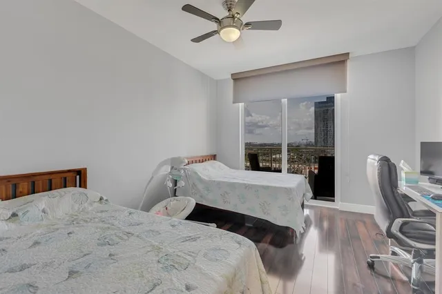 a bedroom with a bed and a table