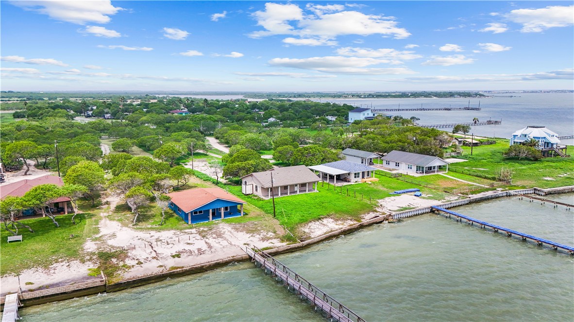 636 South County Road 1150 Riviera, TX 78379 - Photo 20 of 20 an aerial view of a house with a garden and lake view