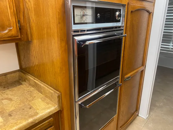a view of a kitchen with a refrigerator