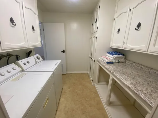 a bathroom with a sink and toilet